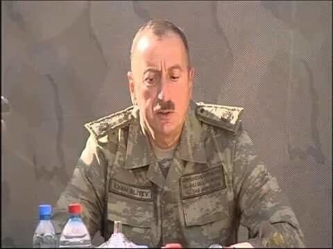 ilham aliyev in kamuflajları giyip cepheye gitmesi - uludağ sözlük